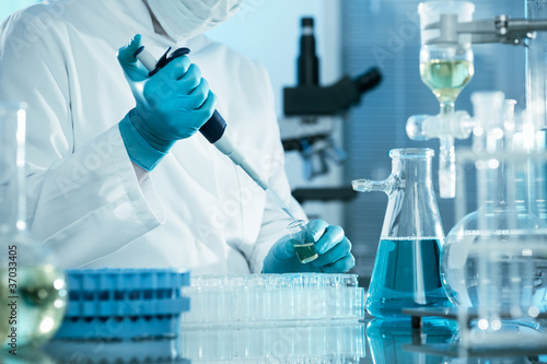 Photo: scientist working at the laboratory scientist working at the laboratory
