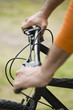 Person riding bicycle, cropped view