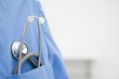 Stethoscope in pocket of scrub top