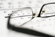 Glasses on eye chart