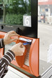 Paying at the gas pump, using credit card reader