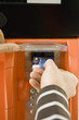 Paying at the gas pump, using credit card reader