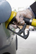 Refueling vehicle, wearing disposable glove
