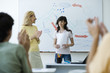 Photo: High school student finishing classroom presentation, classmates and teacher clapping High school student finishing classroom presentation, classmates and teacher clapping