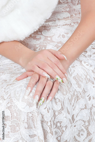 Photo: Hands of bride with manicure Hands of bride with manicure