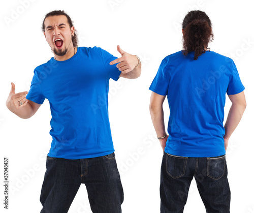 Photo: Male pointing at his blank blue shirt Male pointing at his blank blue shirt
