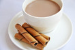 chocolate roll and cup of coffee chocolate roll and cup of coffee