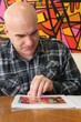 Foto: Portrait of a man with bald head, serious Portrait of a man with bald head, serious
