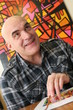 Foto: Portrait of a man with bald head, smiling Portrait of a man with bald head, smiling