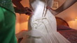 Bride getting dressed