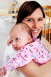 young mother with 7 week old baby