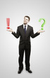 Businessman with a question and exclamation mark