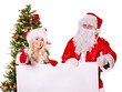 Santa claus and christmas girl holding banner.
