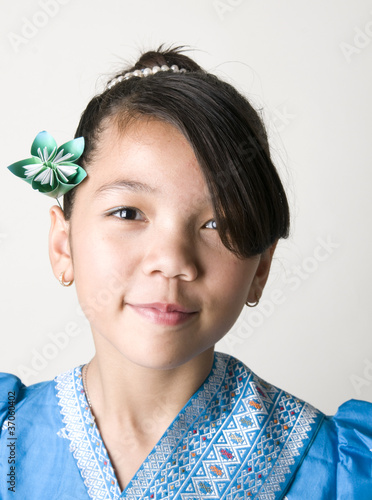 Photo: Asian Girl with Origami Flower Asian Girl with Origami Flower