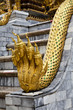 angel head golden naga statue in emarald buddha temple angel head golden naga statue in emarald buddha temple