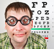 person wearing spectacles in an office at the doctor