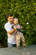 Photo: Father and son playing ping-pong Father and son playing ping-pong