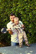 Photo: Father and son playing ping-pong Father and son playing ping-pong