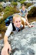 carefree outdoor climbing woman