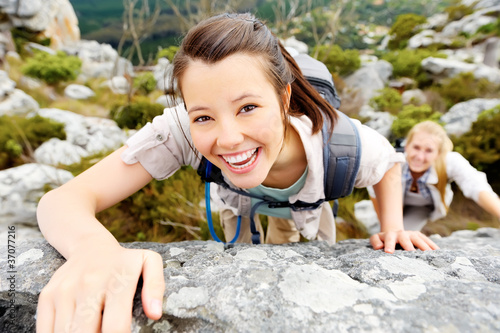 Photo: carefree outdoor climbing woman carefree outdoor climbing woman