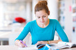 female college student in a library