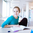 female college student in a library
