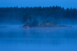 Blue morning fog on lake