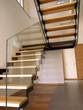 Modern glass, metal and wooden staircase Modern glass, metal and wooden staircase
