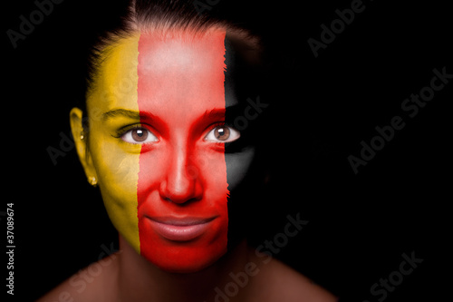 Foto: Portrait of a woman with the flag of the Germany Portrait of a woman with the flag of the Germany