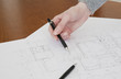 Hand and blueprint