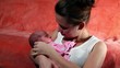 Video: Close-up of mother and baby (slow motion) Close-up of mother and baby (slow motion)