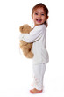 petite fille enlace sa peluche doudou