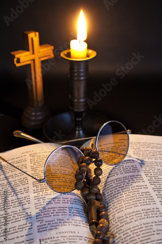 Photo: rosary on bible rosary on bible