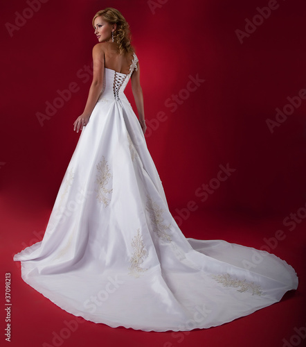 Photo: Fiancee in long white bridal dress Fiancee in long white bridal dress