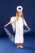 Photo: Christmas angel spending sparkling stars Christmas angel spending sparkling stars