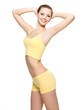 Happy young woman with sporty slim body