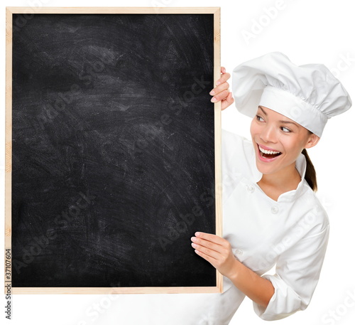 Photo: Chef showing blank menu sign Chef showing blank menu sign