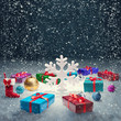 Christmas gift box with christmas balls and big snowflake on sno Christmas gift box with christmas balls and big snowflake on sno