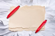 ripped piece of paper with red ribbon. ripped piece of paper with red ribbon.