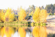 Colorful autumn trees fortress at the river front