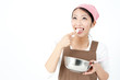 attractive asian woman cooking