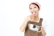 attractive asian woman cooking
