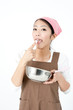 attractive asian woman cooking