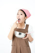 attractive asian woman cooking