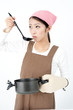 attractive asian woman cooking