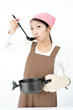 attractive asian woman cooking