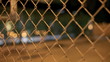 Chainlink fence at night