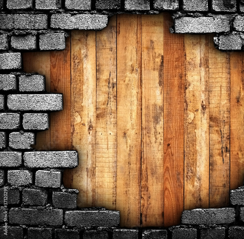 Photo: broken wall with wood background broken wall with wood background