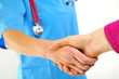 Photo: doctor shaking hands doctor shaking hands