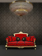 Red sofa and chandelier in royal interior